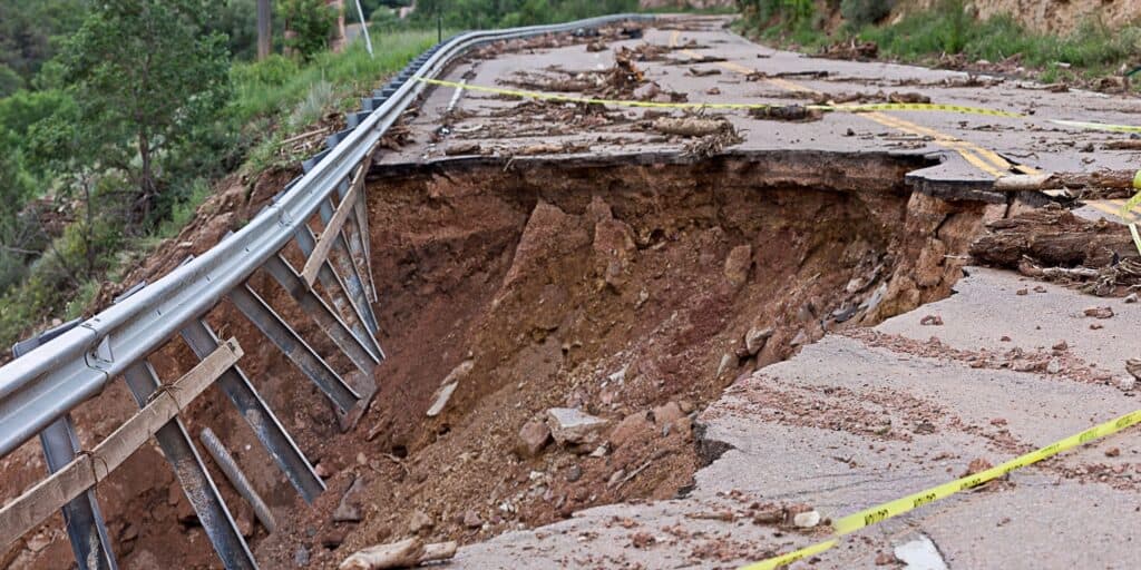 A washed out road as a metaphor for how financial infidelity undermines connection and communication